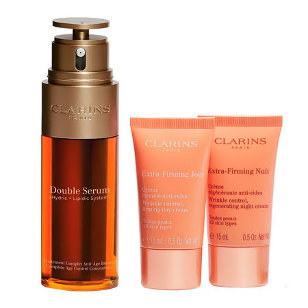 Clarins Paris Age-Defying Set: Face Double Serum 50ml+Extra Firming Day& Night Cream 15ml Each+Eye Serum 0.9ml, 4-Pack - Image 2