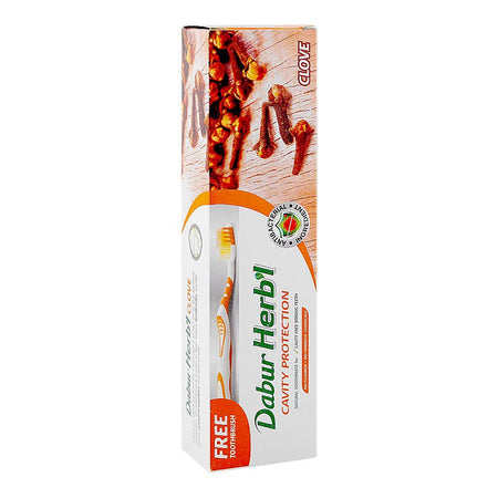 Dabur Herb'l Clove Cavity Protection Toothpaste, 100g + Toothbrush Free - Main Image