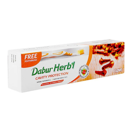 Dabur Herb'l Clove Cavity Protection Toothpaste, 100g + Toothbrush Free - Image 2