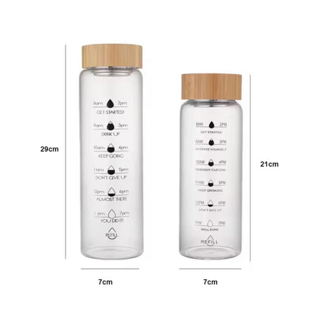 transparent glass water bottle with wooden lid image 10
