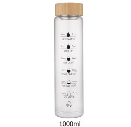 transparent glass water bottle with wooden lid image 9