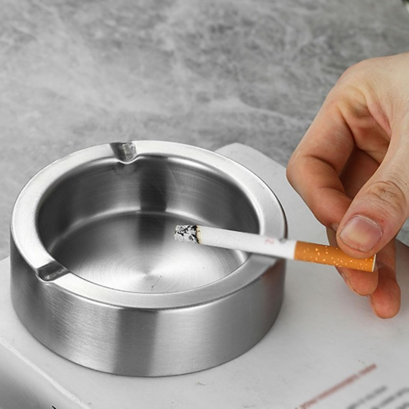 Cigarette stick on silver round ashtray photo – Free Tobacco Image